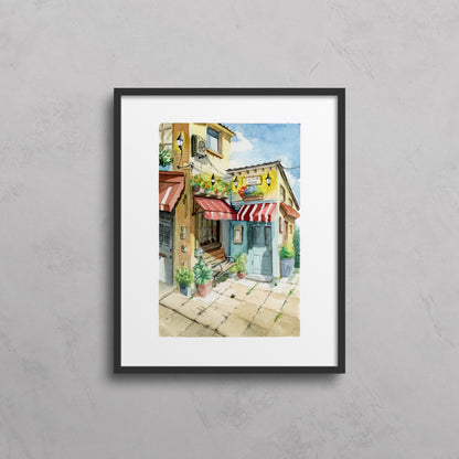 Framed artwork of a colorful street scene on a gray wall